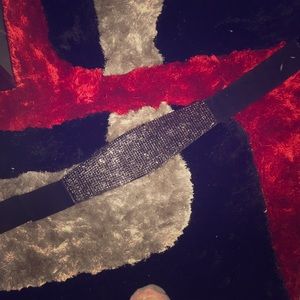 Black rhinestone show stopper belt.